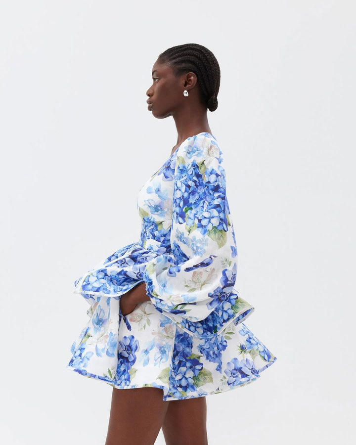 Woman wearing floral mini party dress