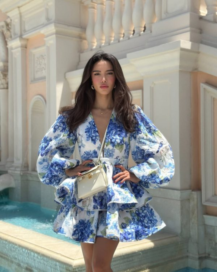 Woman wearing floral mini party dress