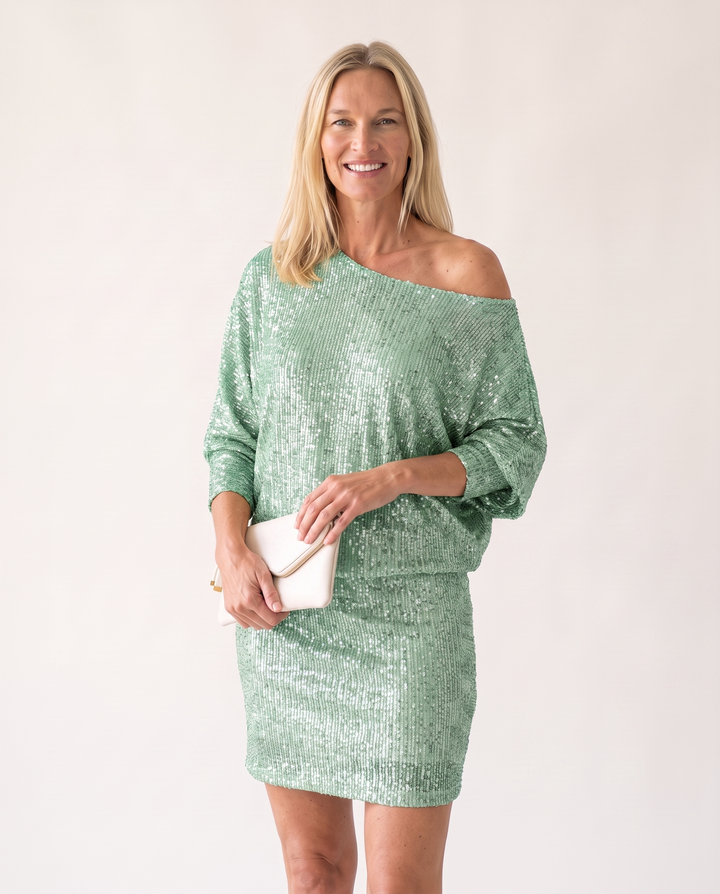 Woman wearing adalyn sequin party dress with radiant glamour