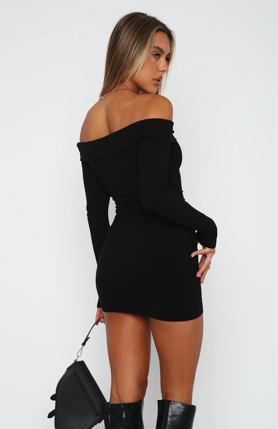 Woman wearing off shoulder mini dress