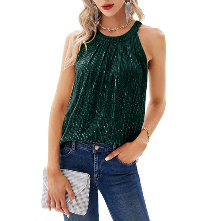 Oriane Delaunay sequin halter neck blouse in dark green with a pleated neckline, worn with jeans