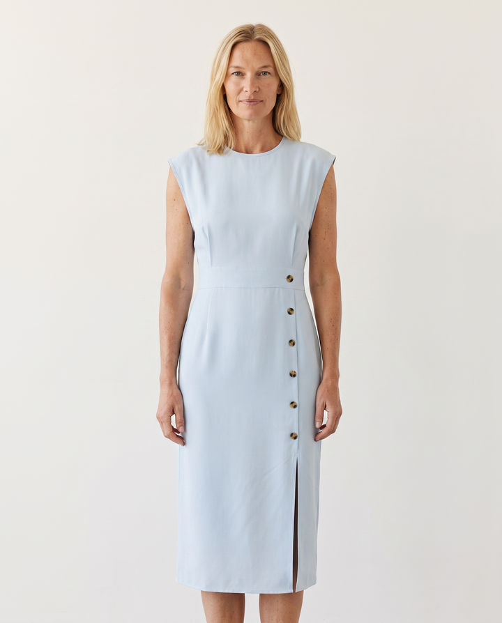 Woman wearing elegant midi office dress