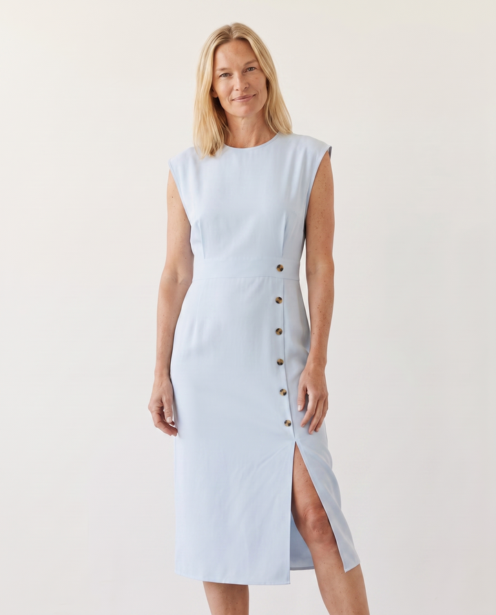 Woman wearing elegant midi office dress
