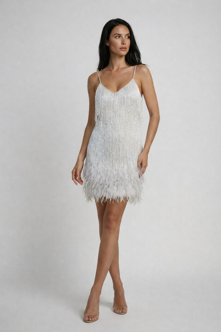 Woman wearing sequin feather mini dress