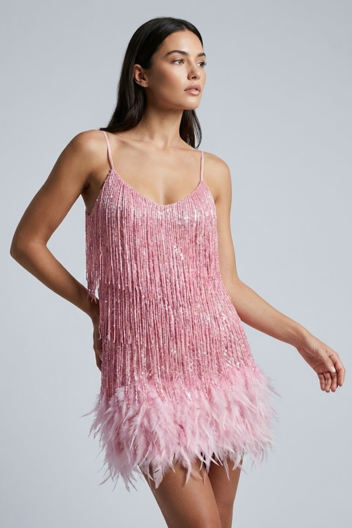 Woman wearing sequin feather mini dress