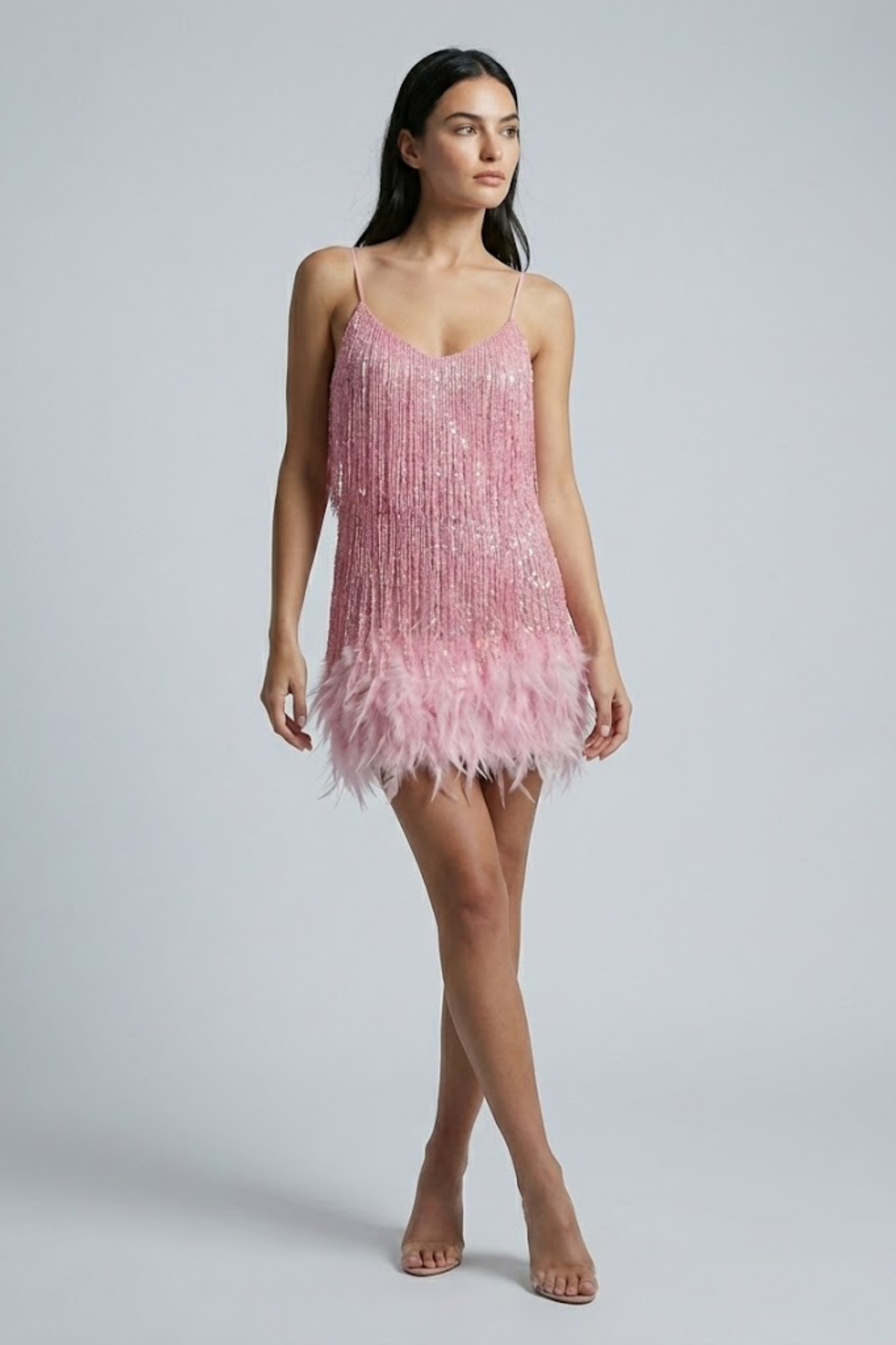 Woman wearing sequin feather mini dress