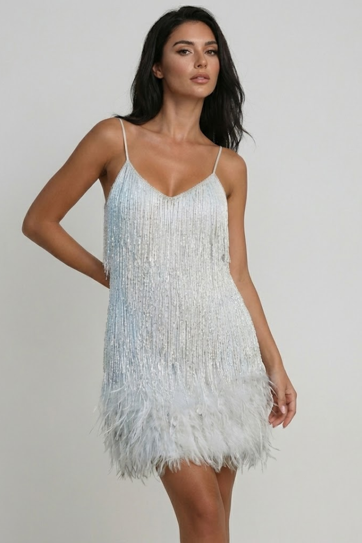 Woman wearing sequin feather mini dress