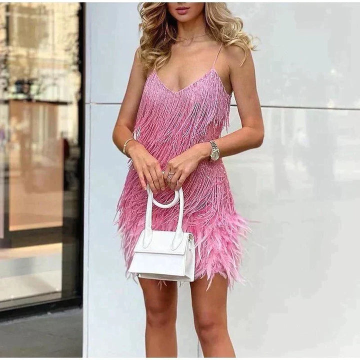 Rosalinde Cassagne fringe mini dress with tiered tassel strands, a feather trimmed hem and deep V neckline