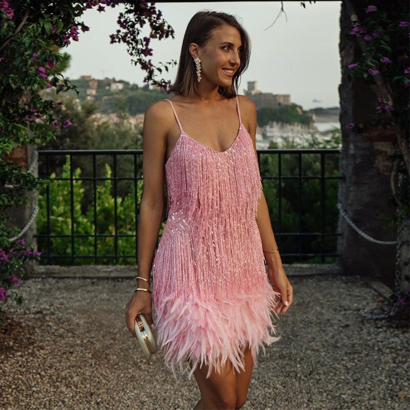 Rosalinde Cassagne fringe mini dress with tiered tassel strands, a feather trimmed hem and deep V neckline