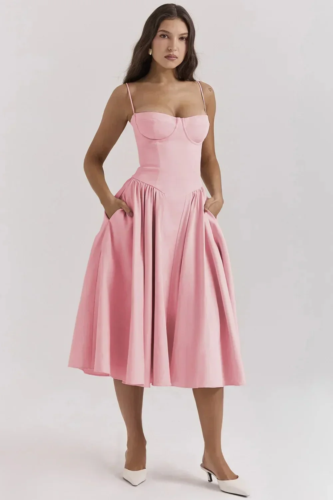 Woman wearing sage green midi dress