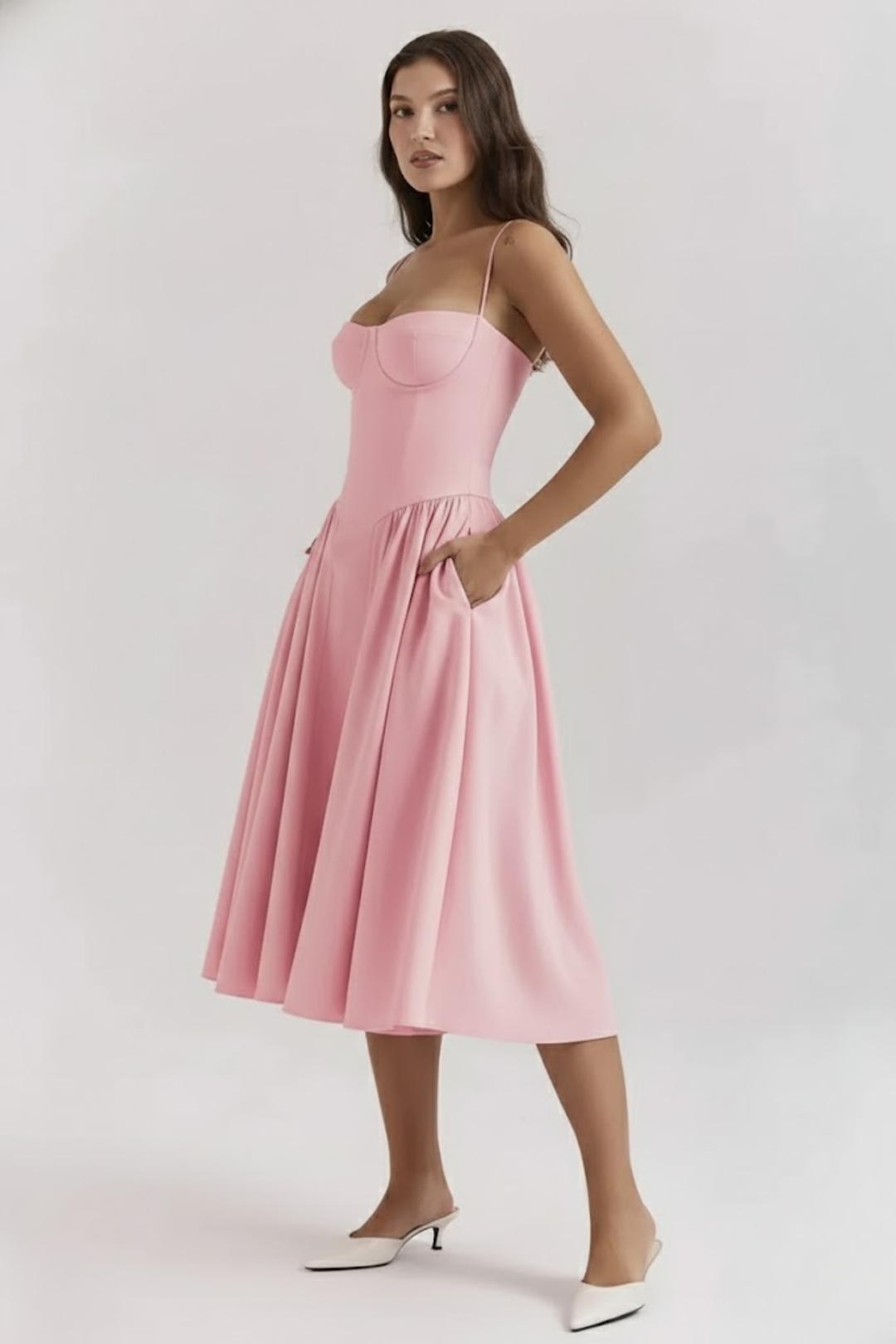 Woman wearing sage green midi dress