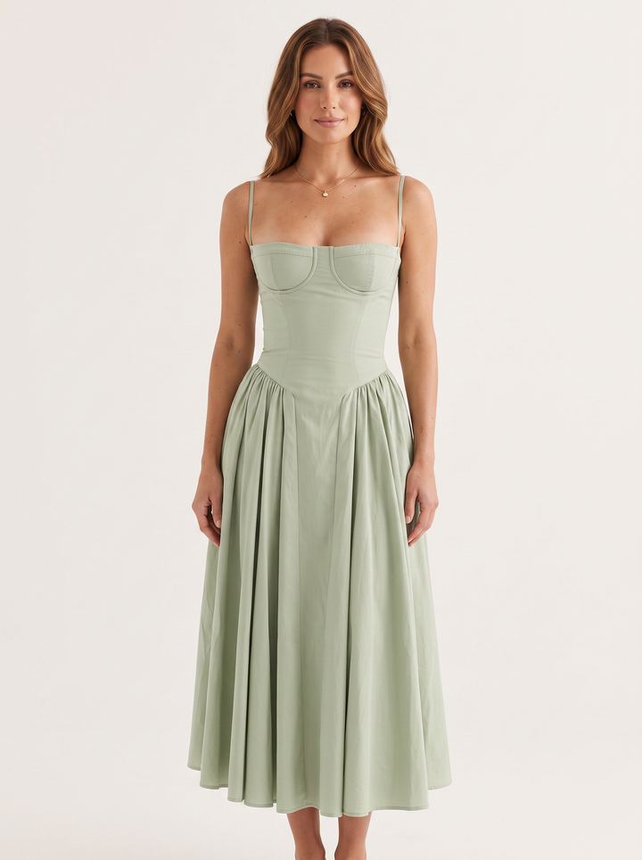 Woman wearing sage green midi dress