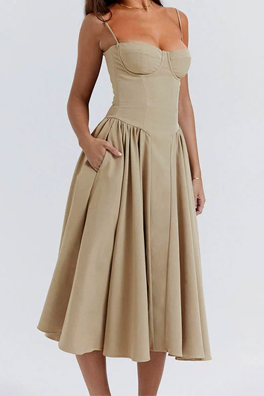 Woman wearing sage green midi dress