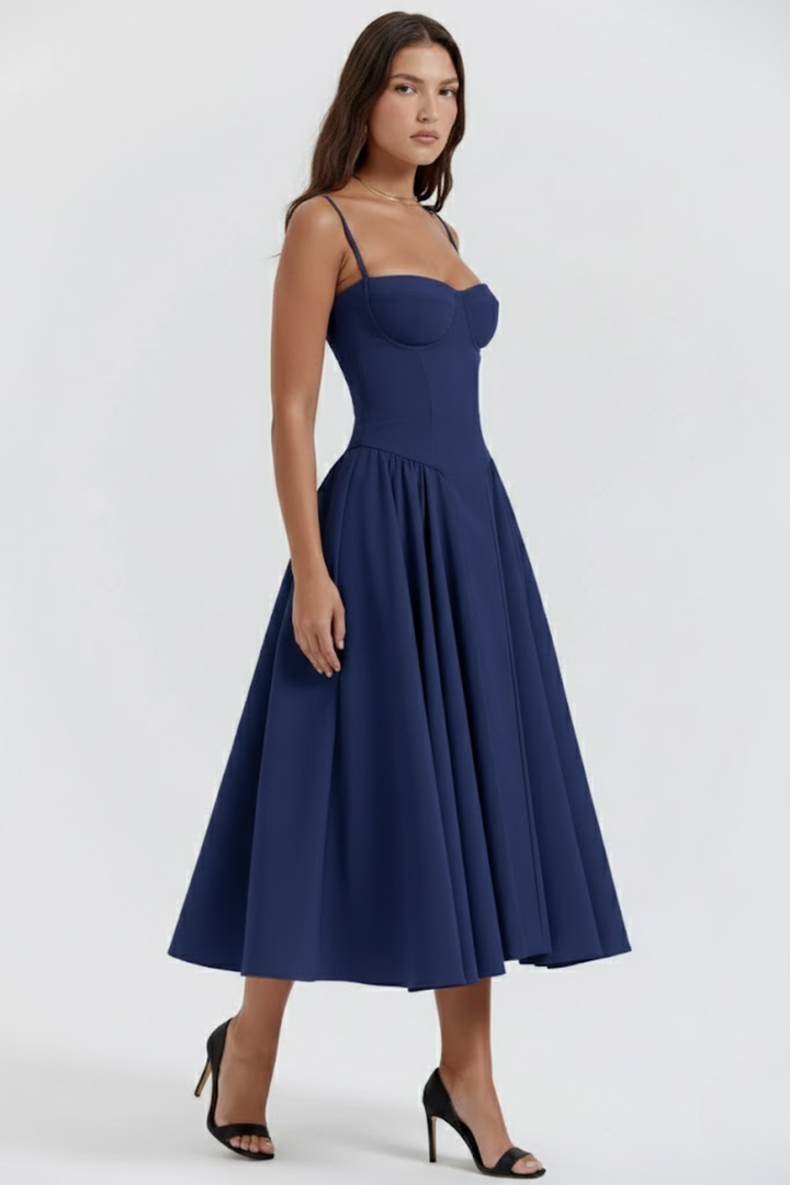 Woman wearing sage green midi dress