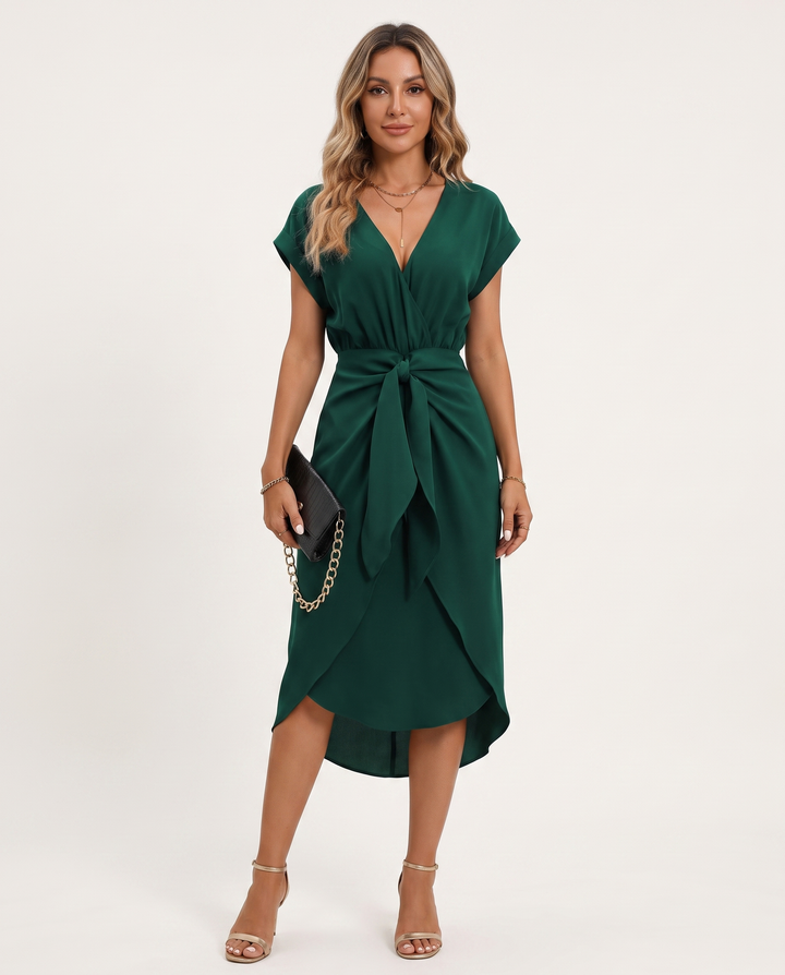 Woman wearing midi wrap dress with tie waist