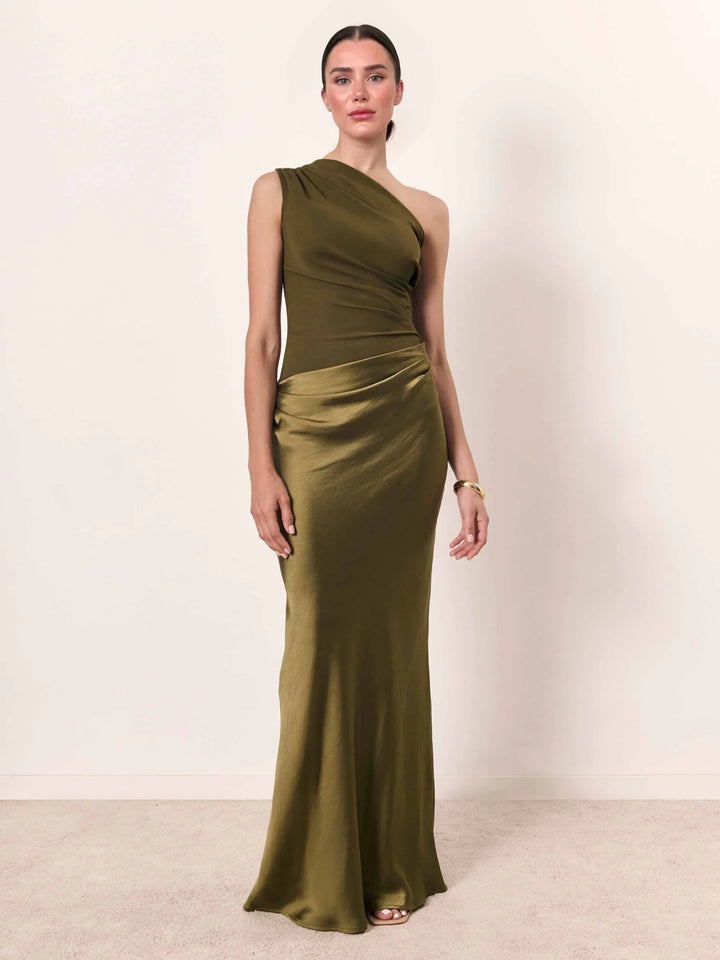 Woman wearing one-shoulder satin evening dress