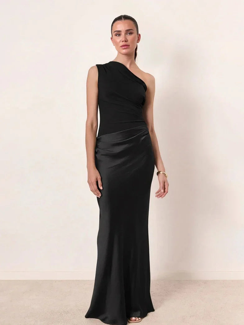 Woman wearing one-shoulder satin evening dress