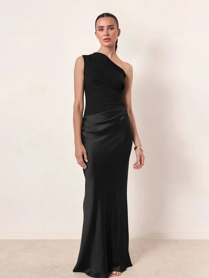 Woman wearing one-shoulder satin evening dress
