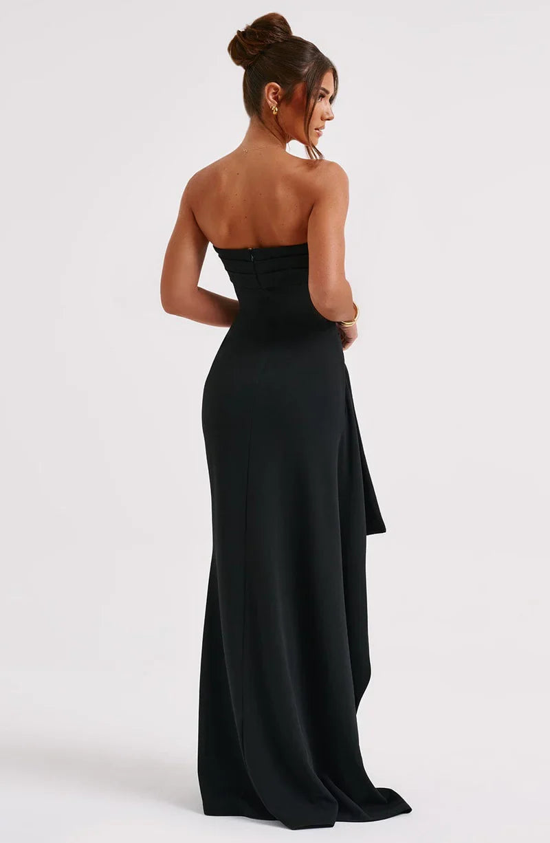 Woman wearing strapless evening maxi dress