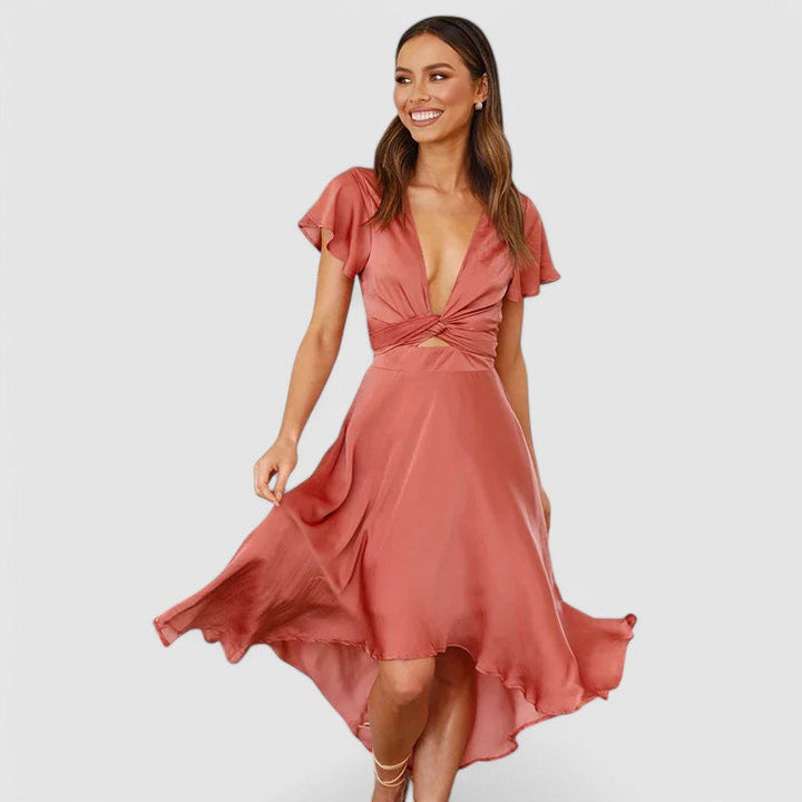Woman wearing flowing wrap midi dress