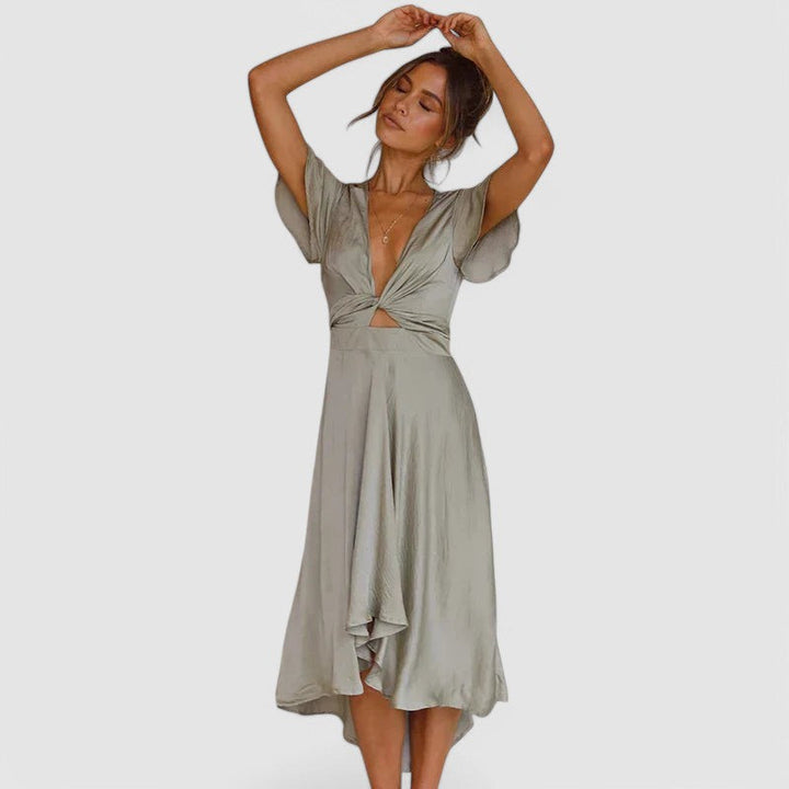 Woman wearing flowing wrap midi dress